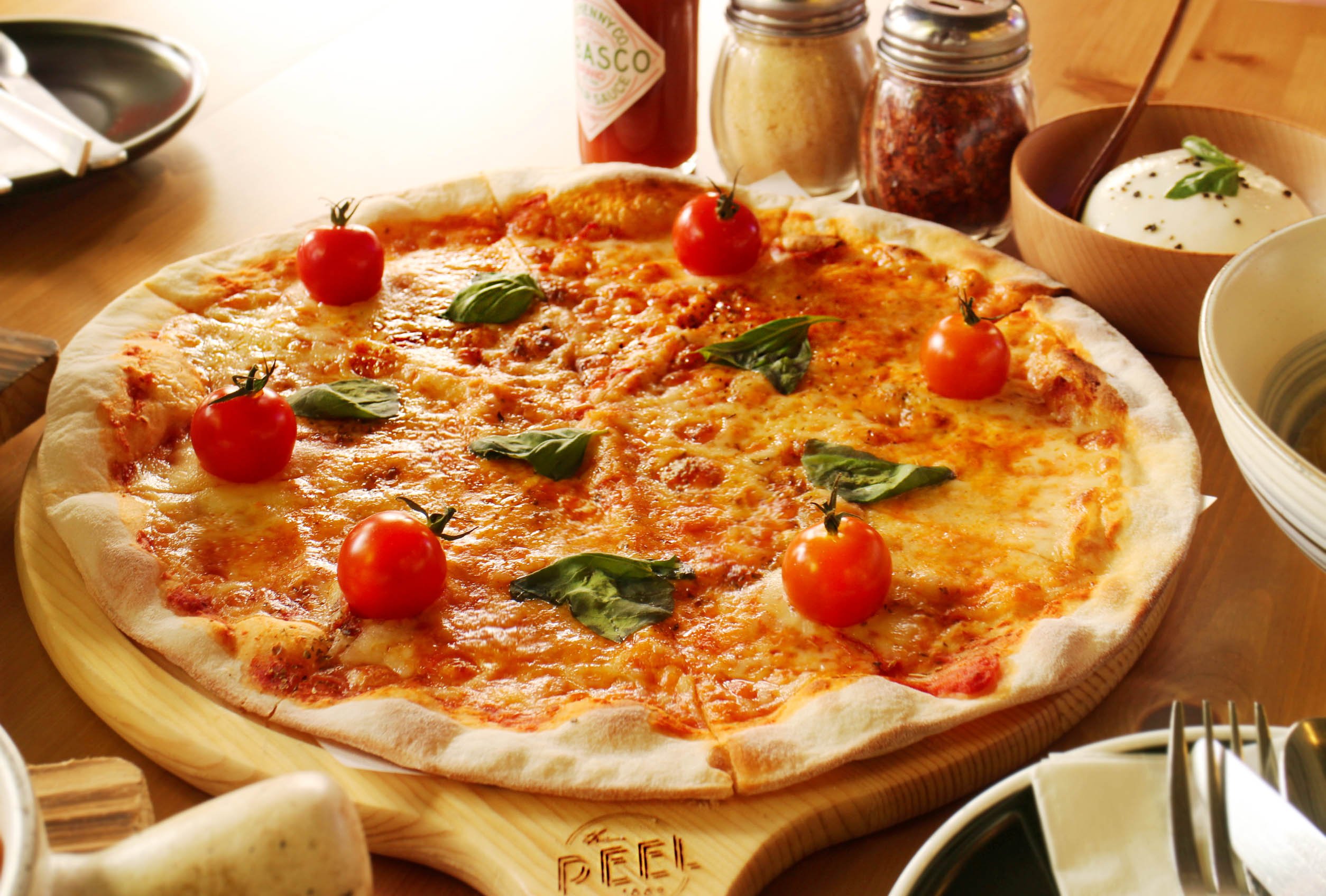 The Margherita at The Peel is served with a generous ball of Burrata cheese, found at MyVillage. 